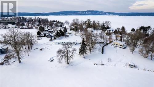 View of the neighbourhood with the skihill in behind - 1142 Barryvale Road, Calabogie, ON - Outdoor With Body Of Water With View