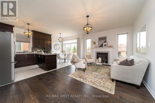65 Allegra Drive, Wasaga Beach, ON - Indoor Photo Showing Living Room With Fireplace