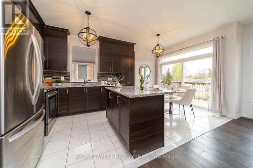 65 Allegra Drive, Wasaga Beach, ON - Indoor Photo Showing Kitchen With Upgraded Kitchen
