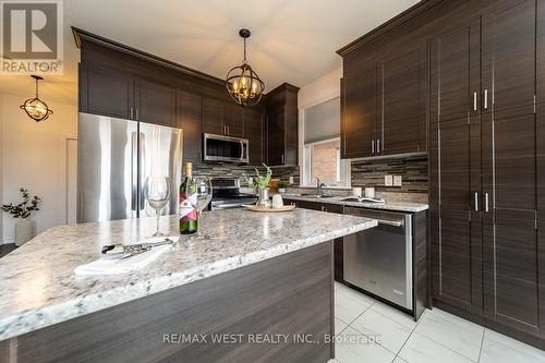 65 Allegra Drive, Wasaga Beach, ON - Indoor Photo Showing Kitchen With Stainless Steel Kitchen With Upgraded Kitchen