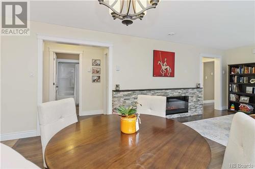 60 Weavers Way, Fredericton, NB - Indoor Photo Showing Living Room With Fireplace