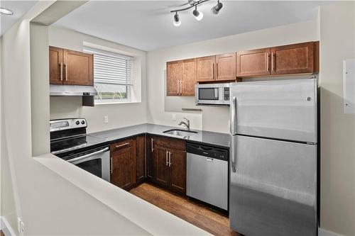 4 716 Corydon Avenue, Winnipeg, MB - Indoor Photo Showing Kitchen With Stainless Steel Kitchen
