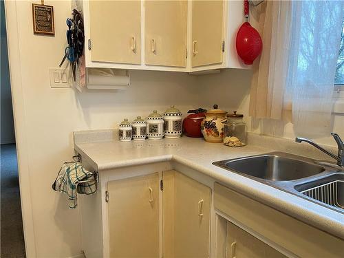 1044 Russell Street, Brandon, MB - Indoor Photo Showing Kitchen With Double Sink