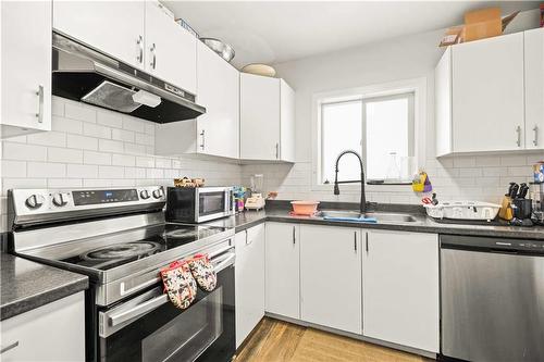 220 Bredin Drive, Winnipeg, MB - Indoor Photo Showing Kitchen With Double Sink