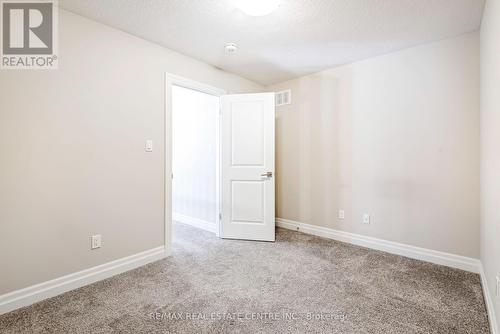 23 Carriage Crossing, Mapleton, ON - Indoor Photo Showing Other Room