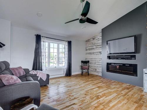 Living room - 33 Rue De La Normandie, Rougemont, QC - Indoor Photo Showing Living Room With Fireplace