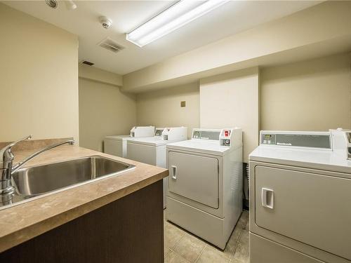 204-1600 Caspers Way, Nanaimo, BC - Indoor Photo Showing Laundry Room