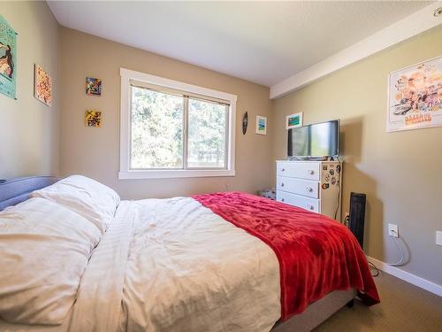 204-1600 Caspers Way, Nanaimo, BC - Indoor Photo Showing Bedroom