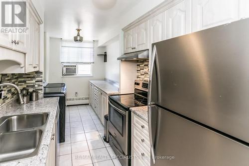 206 - 1615 Bloor Street, Mississauga, ON - Indoor Photo Showing Kitchen With Double Sink