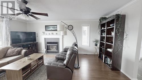 8308 90 Avenue, Fort St. John, BC - Indoor Photo Showing Living Room With Fireplace