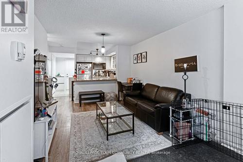 #307 -140 Simcoe St, Toronto, ON - Indoor Photo Showing Living Room With Fireplace