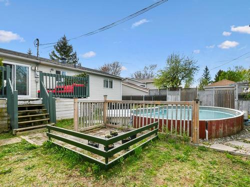 Backyard - 859 Rue Des Paysans, Sainte-Julie, QC - Outdoor With Above Ground Pool