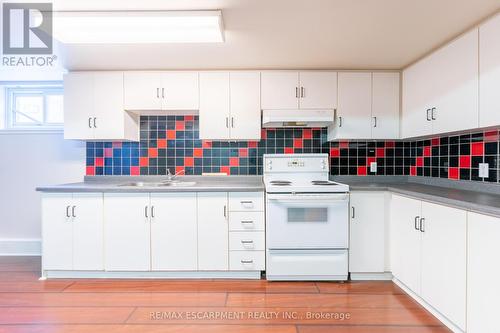 1008 Upper Wellington Street, Hamilton, ON - Indoor Photo Showing Kitchen With Double Sink