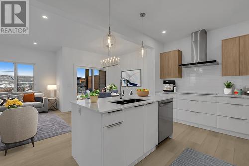 301 Arrowleaf Rise, Coldstream, BC - Indoor Photo Showing Kitchen With Double Sink