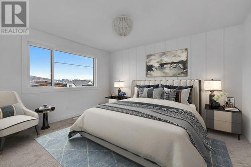 301 Arrowleaf Rise, Coldstream, BC - Indoor Photo Showing Bedroom
