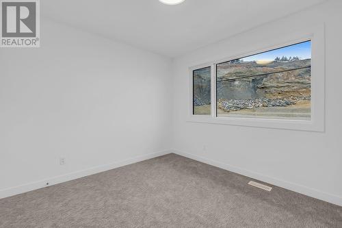 301 Arrowleaf Rise, Coldstream, BC - Indoor Photo Showing Other Room