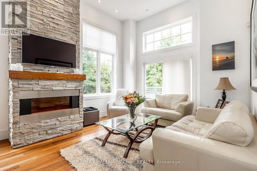 98 Savannah Crescent, Wasaga Beach, ON - Indoor Photo Showing Living Room With Fireplace