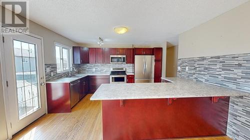 9715 91 Street, Fort St. John, BC - Indoor Photo Showing Kitchen With Upgraded Kitchen