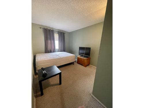 207C - 1802 Alpine Drive, Elkford, BC - Indoor Photo Showing Bedroom