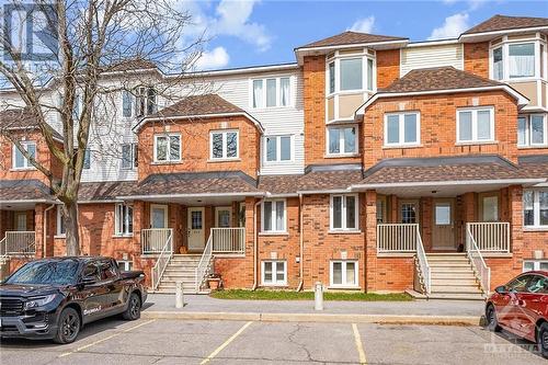Brick exterior and parking is directly in front of your unit. - 418 Briston Private, Ottawa, ON - Outdoor With Facade