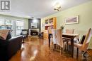 Gleaming hardwood flooring in Living/Dining rooms. - 418 Briston Private, Ottawa, ON  - Indoor With Fireplace 
