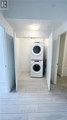 208 - 55 Duke Street W, Kitchener, ON - Indoor Photo Showing Laundry Room