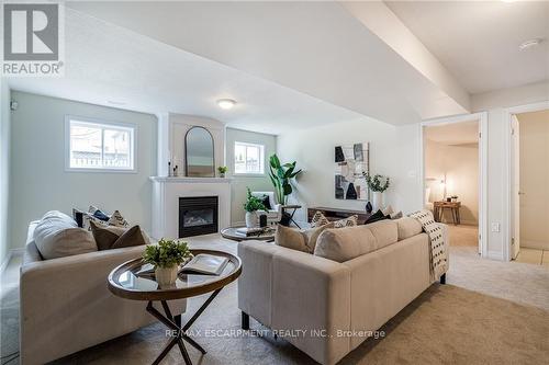 93 Hepburn Crescent, Hamilton, ON - Indoor Photo Showing Living Room With Fireplace