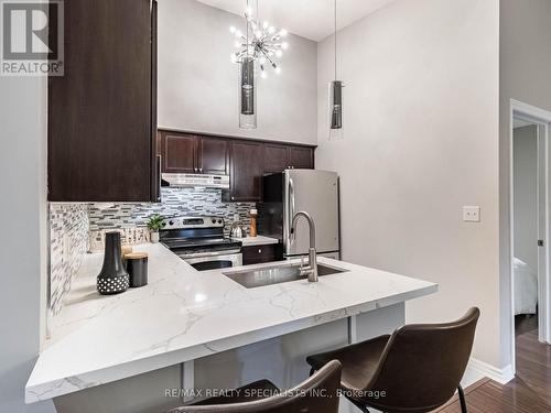 408 - 1380 Main Street E, Milton, ON - Indoor Photo Showing Kitchen With Upgraded Kitchen