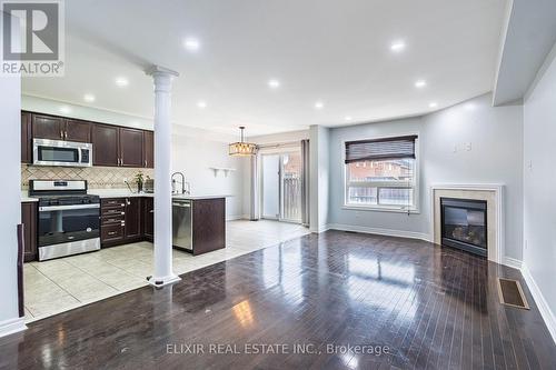 61 Bushmill Circle, Brampton, ON - Indoor Photo Showing Kitchen With Fireplace With Upgraded Kitchen