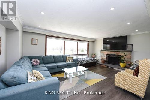 14771 Dixie Road, Caledon, ON - Indoor Photo Showing Living Room With Fireplace