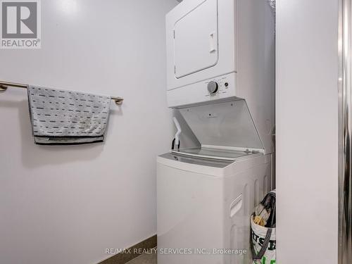 2303 - 2550 Simcoe Street N, Oshawa, ON - Indoor Photo Showing Laundry Room