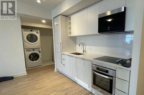 2707 - 2033 Kennedy Road, Toronto, ON - Indoor Photo Showing Laundry Room