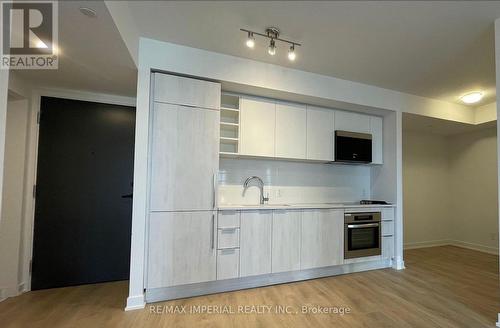 2707 - 2033 Kennedy Road, Toronto, ON - Indoor Photo Showing Kitchen