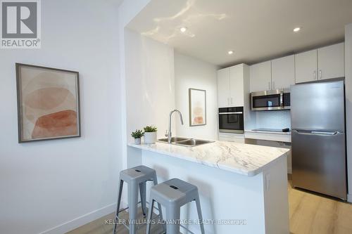 307 - 2382 Kingston Road, Toronto, ON - Indoor Photo Showing Kitchen With Double Sink