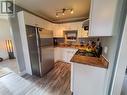 10209 17 Street Unit# 113, Dawson Creek, BC  - Indoor Photo Showing Kitchen With Double Sink 