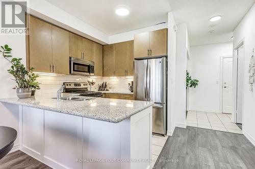 #604 -133 Wynford Dr, Toronto, ON - Indoor Photo Showing Kitchen With Upgraded Kitchen