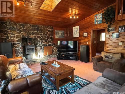 613 Niskemin Drive, Lac La Ronge, SK - Indoor Photo Showing Living Room With Fireplace