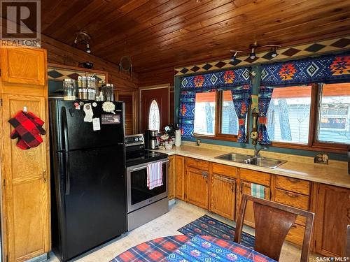 613 Niskemin Drive, Lac La Ronge, SK - Indoor Photo Showing Kitchen With Double Sink