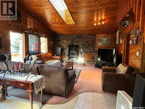 613 Niskemin Drive, Lac La Ronge, SK - Indoor Photo Showing Living Room With Fireplace