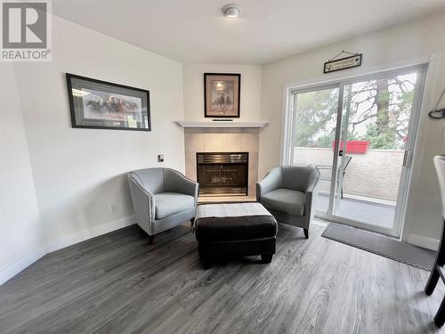 1634 Carmi Avenue Unit# 149, Penticton, BC - Indoor Photo Showing Living Room With Fireplace