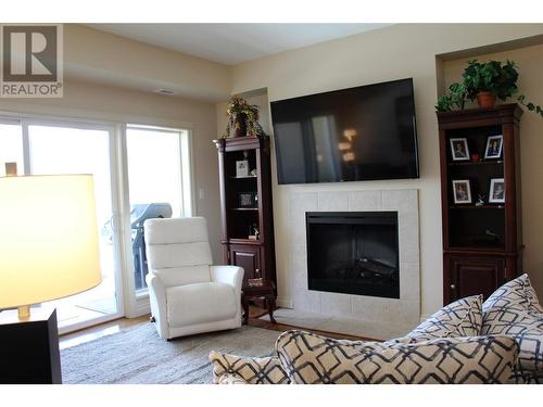 7922 Okanagan Landing Road Unit# 502, Vernon, BC - Indoor Photo Showing Other Room With Fireplace