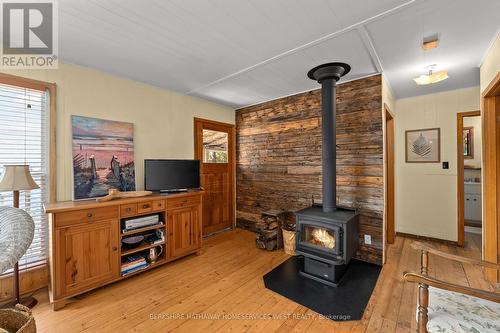 279 Weslemkoon Lake, Addington Highlands, ON - Indoor With Fireplace