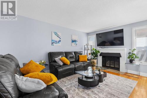 35 Chancton Crescent, London, ON - Indoor Photo Showing Living Room With Fireplace
