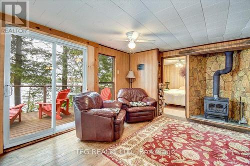 1097 Corylus Lane, Dysart Et Al, ON - Indoor Photo Showing Living Room With Fireplace