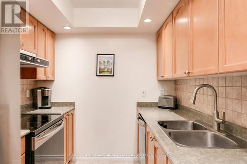 716 - 5233 Dundas Street W, Toronto, ON - Indoor Photo Showing Kitchen With Double Sink