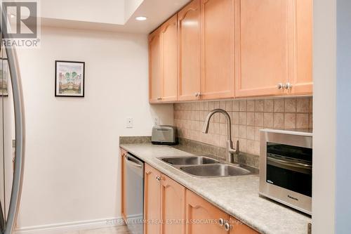 716 - 5233 Dundas Street W, Toronto, ON - Indoor Photo Showing Kitchen With Double Sink