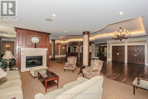 716 - 5233 Dundas Street W, Toronto, ON - Indoor Photo Showing Living Room With Fireplace