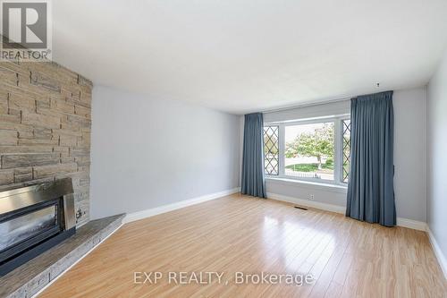 202 Mcmurchy Avenue S, Brampton, ON - Indoor Photo Showing Living Room With Fireplace