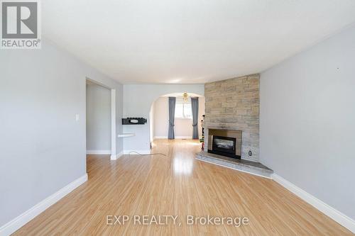 202 Mcmurchy Avenue S, Brampton, ON - Indoor Photo Showing Living Room With Fireplace