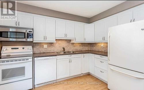 100 Rawling Crescent, Brampton, ON - Indoor Photo Showing Kitchen With Double Sink